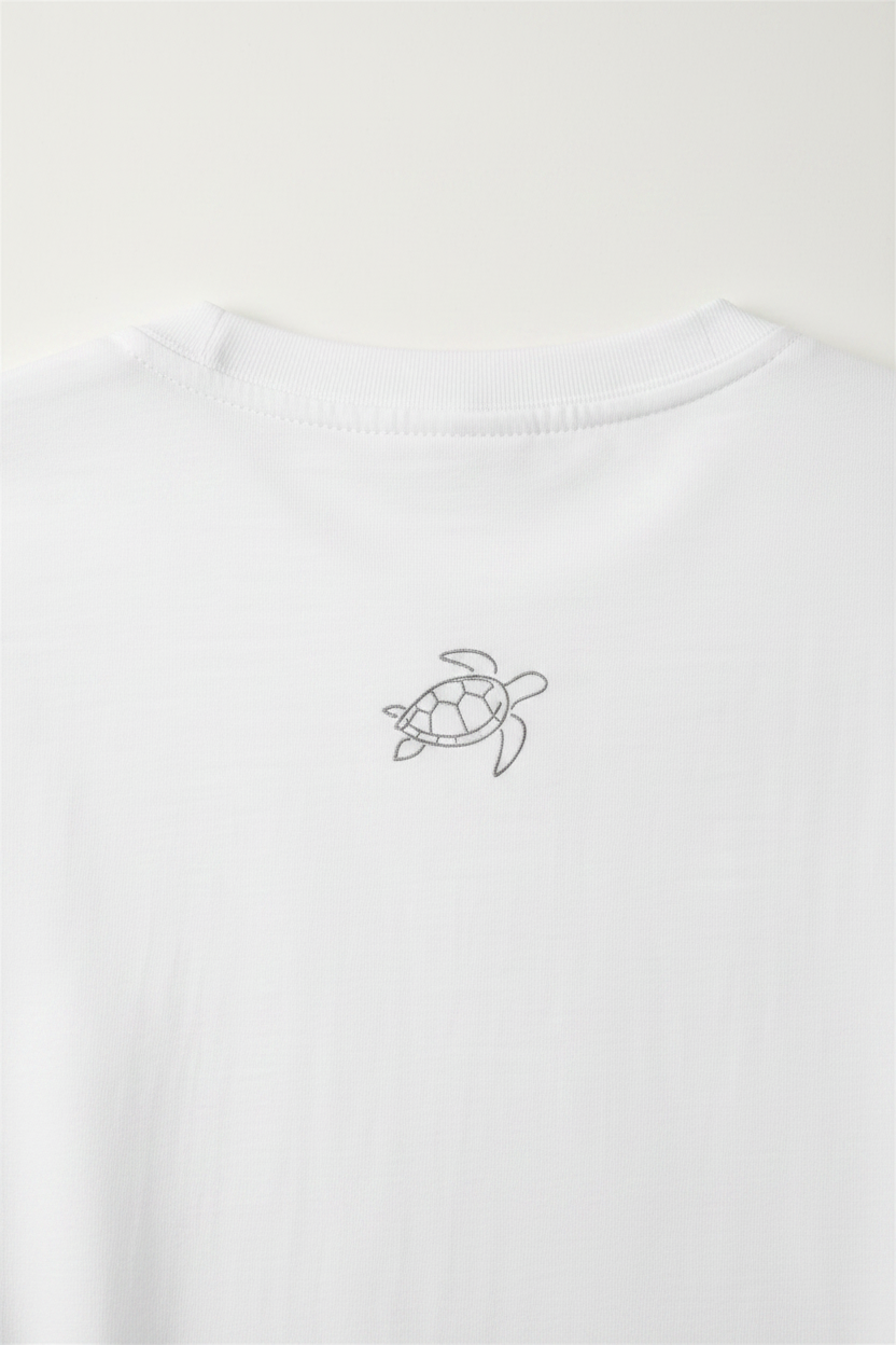 Close-up of turtle graphic on back of Hidd Classic Tee